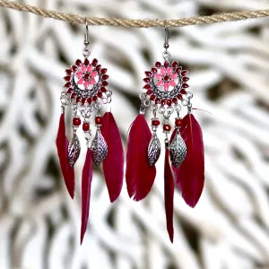 Bohemian-style dreamcatcher bold red feather earrings