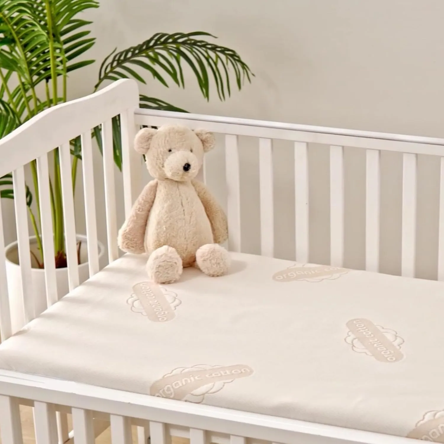 Deluxe Organic Waterproof Crib Mattress Pad - Organic Cotton Crib Mattress Protector for Baby and Toddler Beds - Breathable, Skin-Friendly, Premium 280GSM Knitted Jacquard, Jersey Cotton Skirt